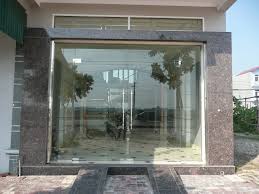 Cửa kính bàn lề sàn 12